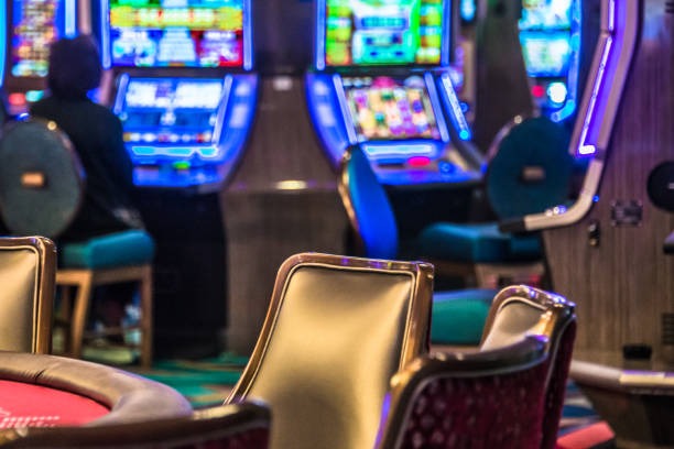 bwin 365 mobile app interface showing slot games and live casino options